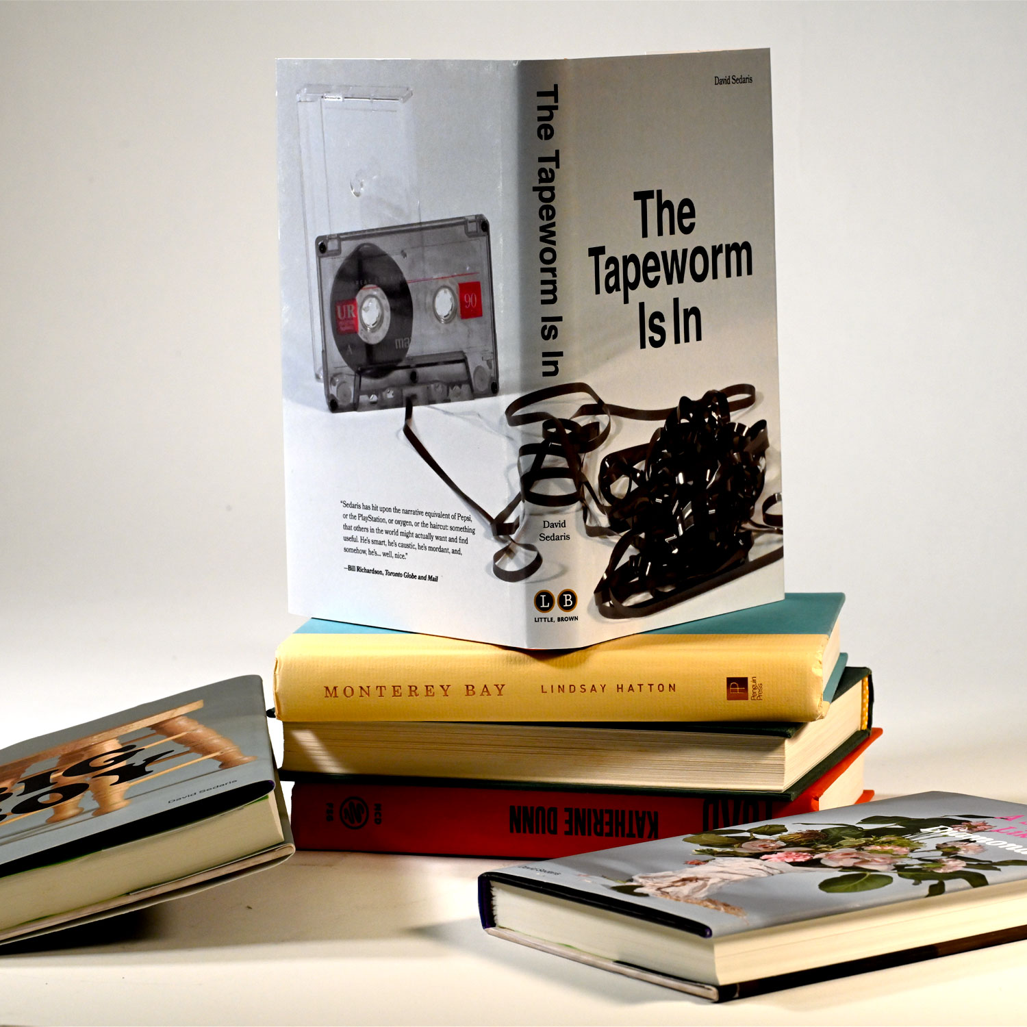 image of the back of 3 bookcovers