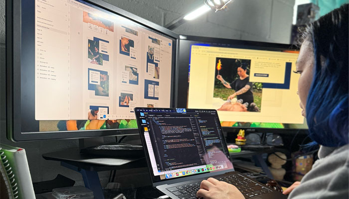 Jackie coding JKC Wellness' website