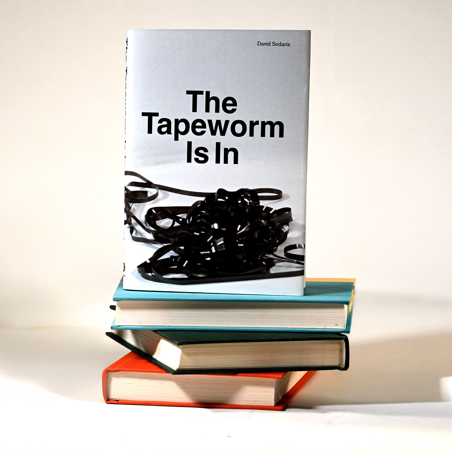image of the back of 3 bookcovers
