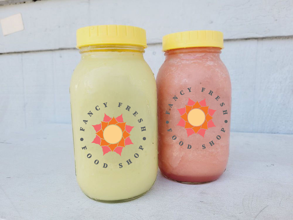 Fancy Fresh Juice Shop logo on a jar of jucie