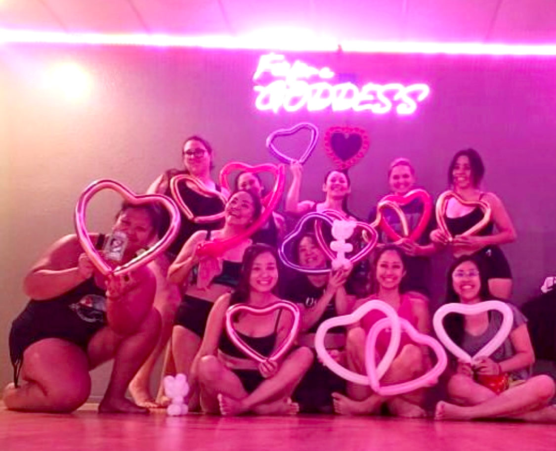 Image of women graduating from their Pole Level