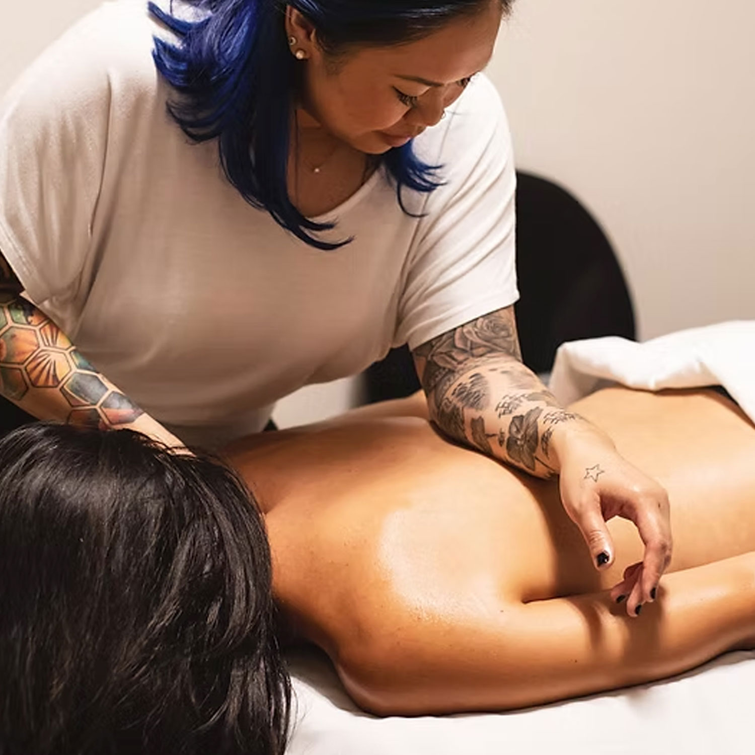 JKC Wellness massaging someone